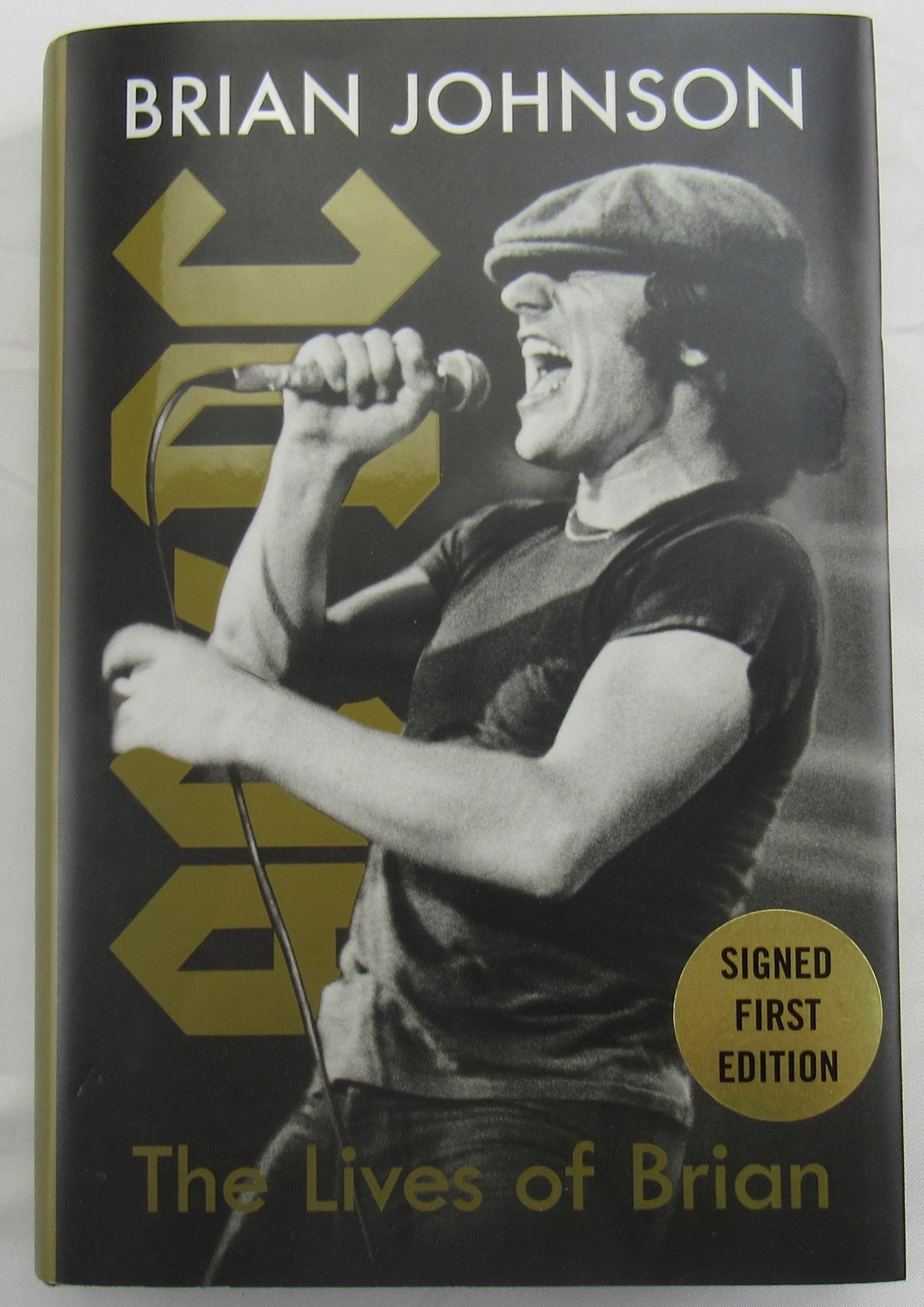 Brian Johnson Signed Auto Autograph Hardcover Book JSA AV66198